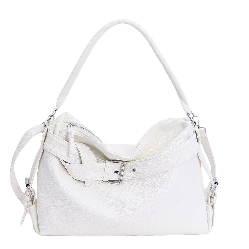 White large retro tote bag with a belt buckle on a white background